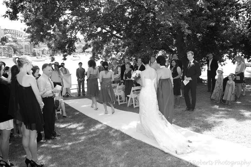Bride walking down aisle - wedding photography